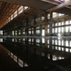 Illustration for article titled Abandoned Shipyard Halls Look Magical After Heavy Rain